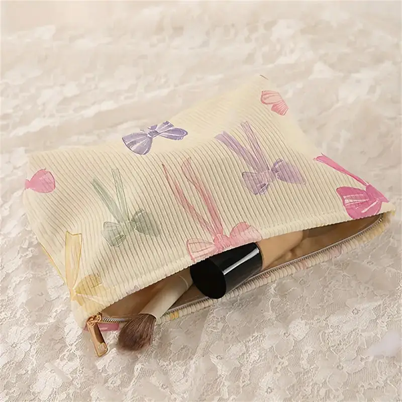

Minimally designed bow pattern printed corduroy zipper makeup bag, lightweight and multifunctional cosmetic storage bag