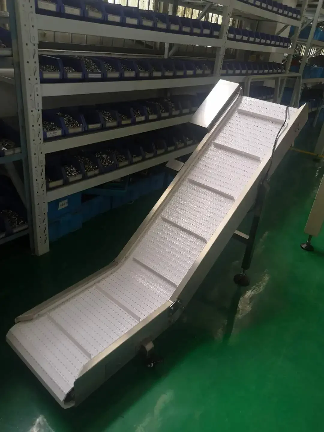 Low cost finished product take off conveyor for food