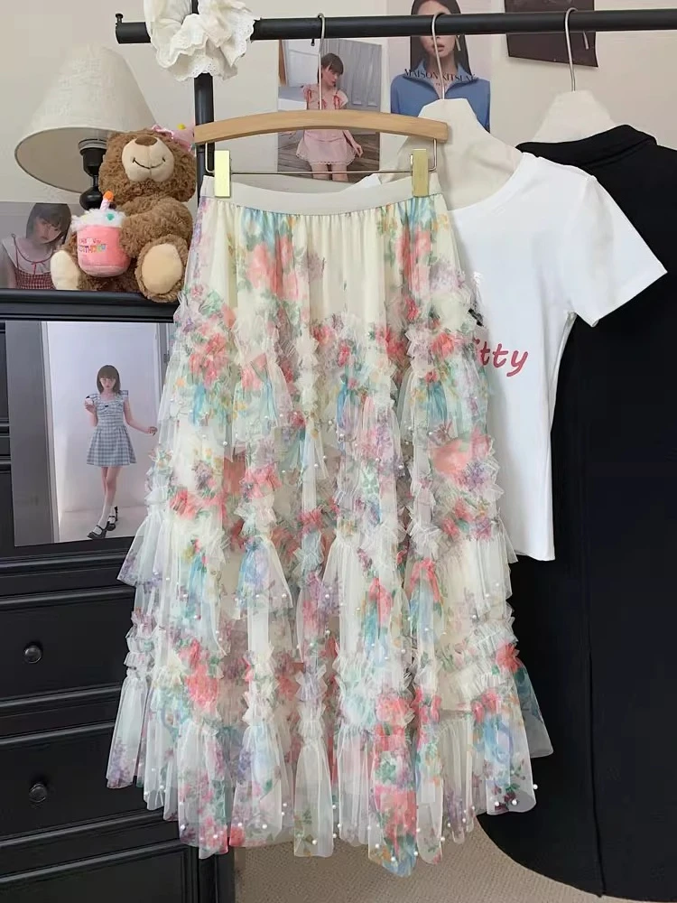 Perlenbesetzte unregelmäßige hohe Taille Rüschen Blumenröcke weiblich 2025, Sommer, Reisen, Urlaub, Datum, Party, knielanger Rock mit Blumendruck