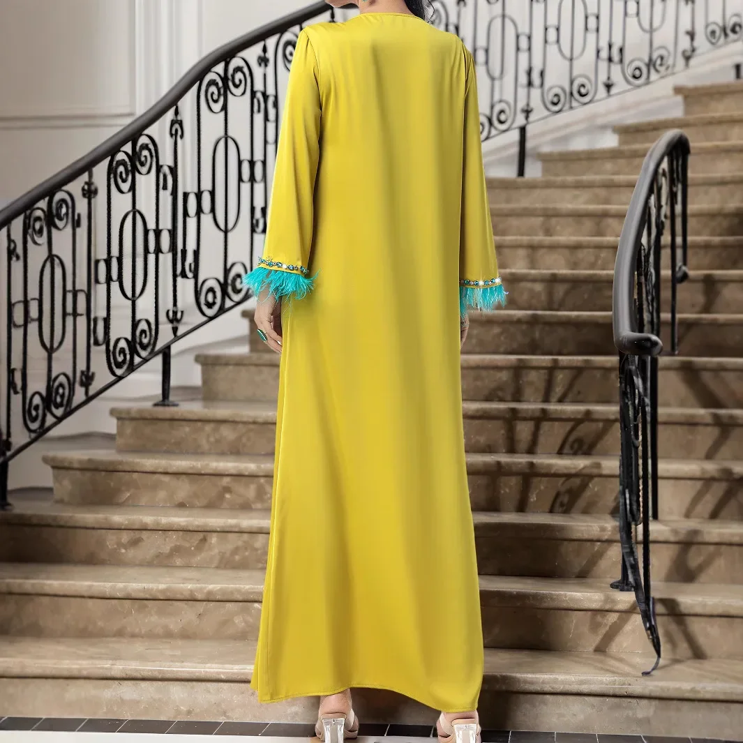 Ramadán diamantes Abaya Dubai vestido musulmán de plumas de lujo mujeres ropa Islam Eid Robe Femme Musulmane Abayas Damen Kaftan vestido