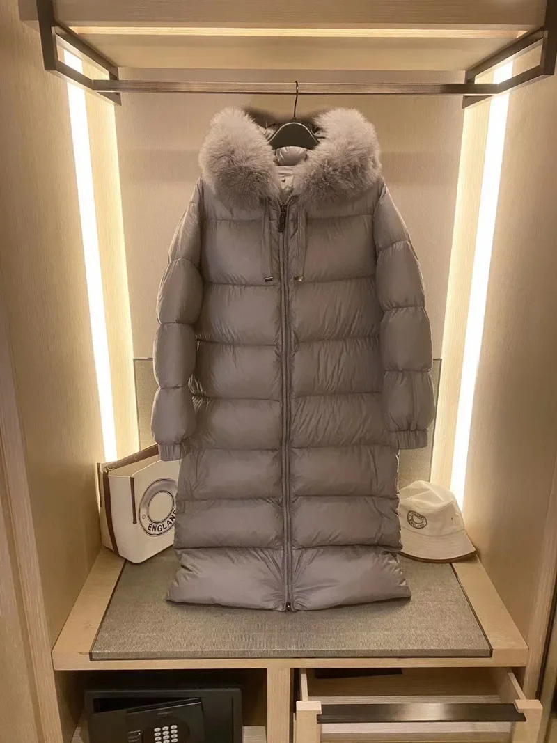 Winter 2023 new down coat women's Extended length thick waist slimming Warm and thickened High end down jacket coat