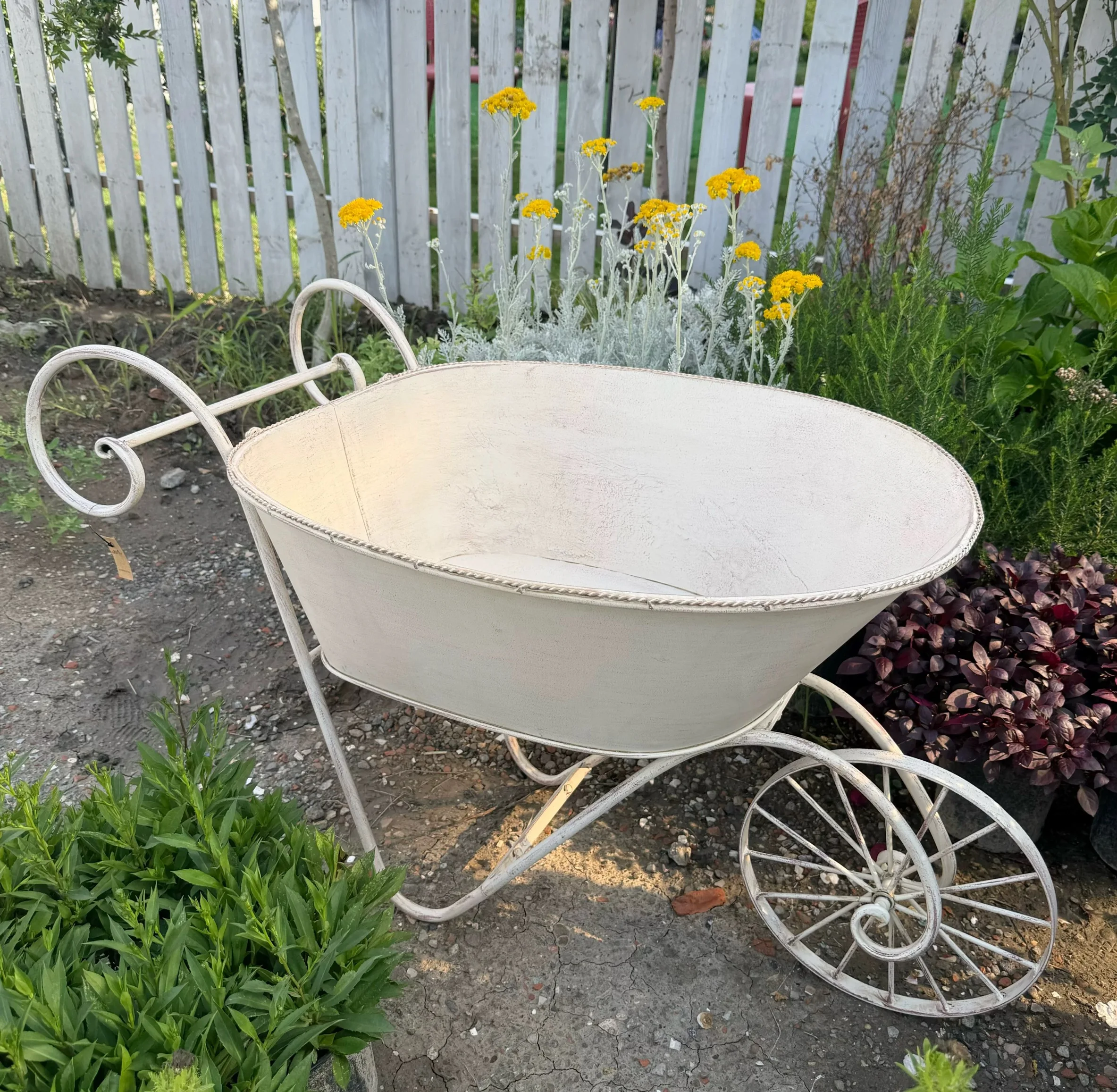 

Decorative Metal Wheelbarrow Garden Planter Cart, White Distressed Finish, Large Capacity with Wheels and Handles, 42.5x21.3x24