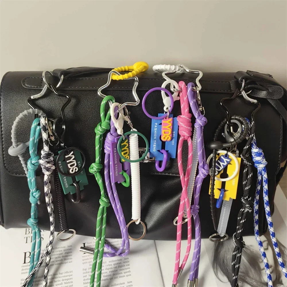 

2024 New Creative Trend Letter Brand Keychain Color blocked Weaving Rope Hanging Decoration Men's and Women's Bag Pendant