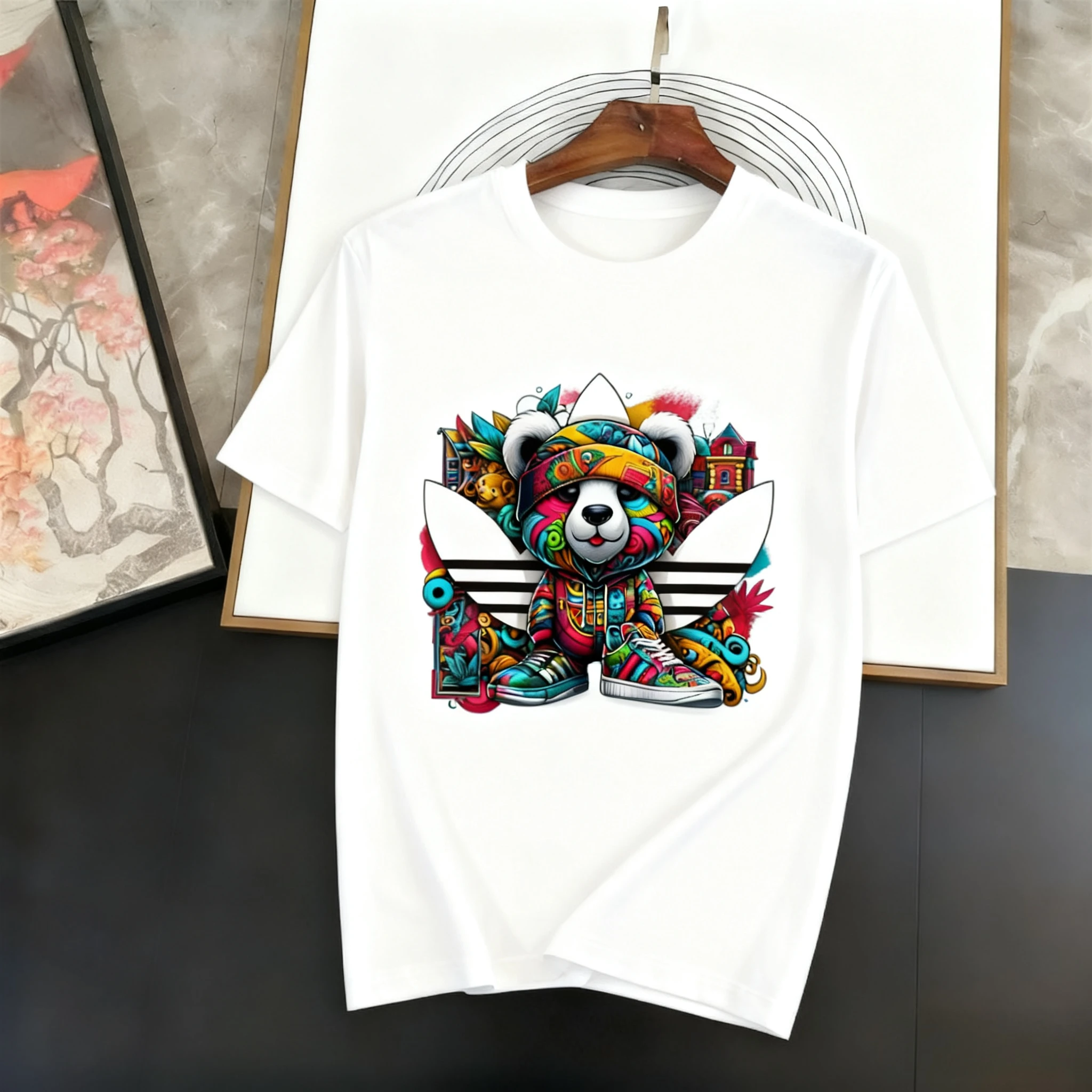 تي شيرت فضفاض متعدد الأغراض مطبوع منقوش من القطن الخالص 2025 صيف جديد بياقة بحار بأكمام قصيرة للرجال والنساء