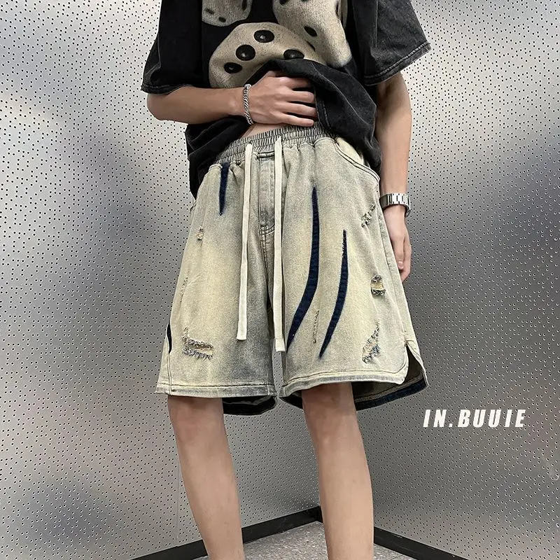 

Men's New Elastic Waist Pocket Fashionable Solid Color Five-point Loose and Versatile Yellow Mud Ripped Denim Shorts