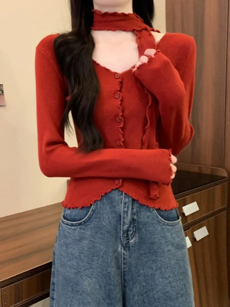 

Niche color blocking black fungus edge V-neck ribbon knitted shirt women in autumn and winter slim fit stylish pullover