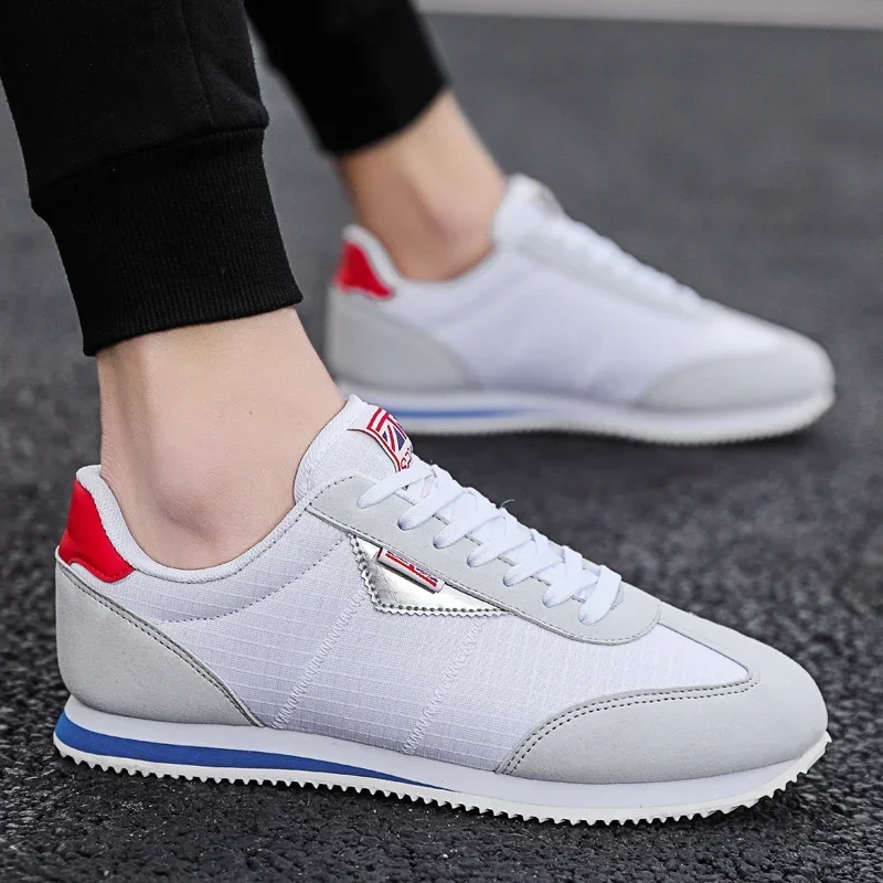 Sznurowane męskie buty do tenisa sportowego na świeżym powietrzu Zapatillas Hombre Lekkie buty do biegania dla mężczyzn Designerskie siatkowe