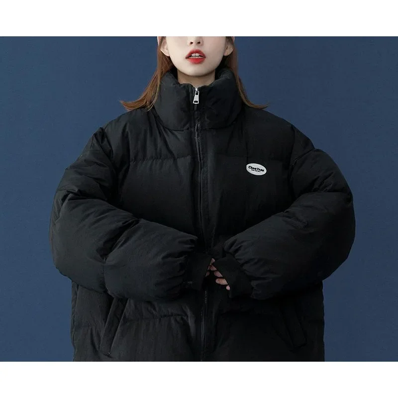 Manteau chaud en coton avec fermeture éclair pour femme, coupe ample, court, doudoune, col montant, manchette coupe-vent, vêtements d'extérieur à la mode, nouvelle collection hiver 2025