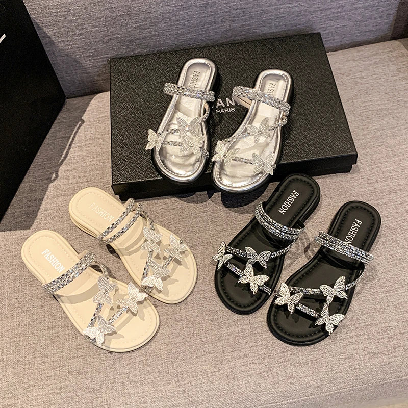 

Women's Slippers 2026 Summer Fashion Casual Open Toe Round Head Thin Bottom Solid Color Bow Bright Diamond Fashion Slippers