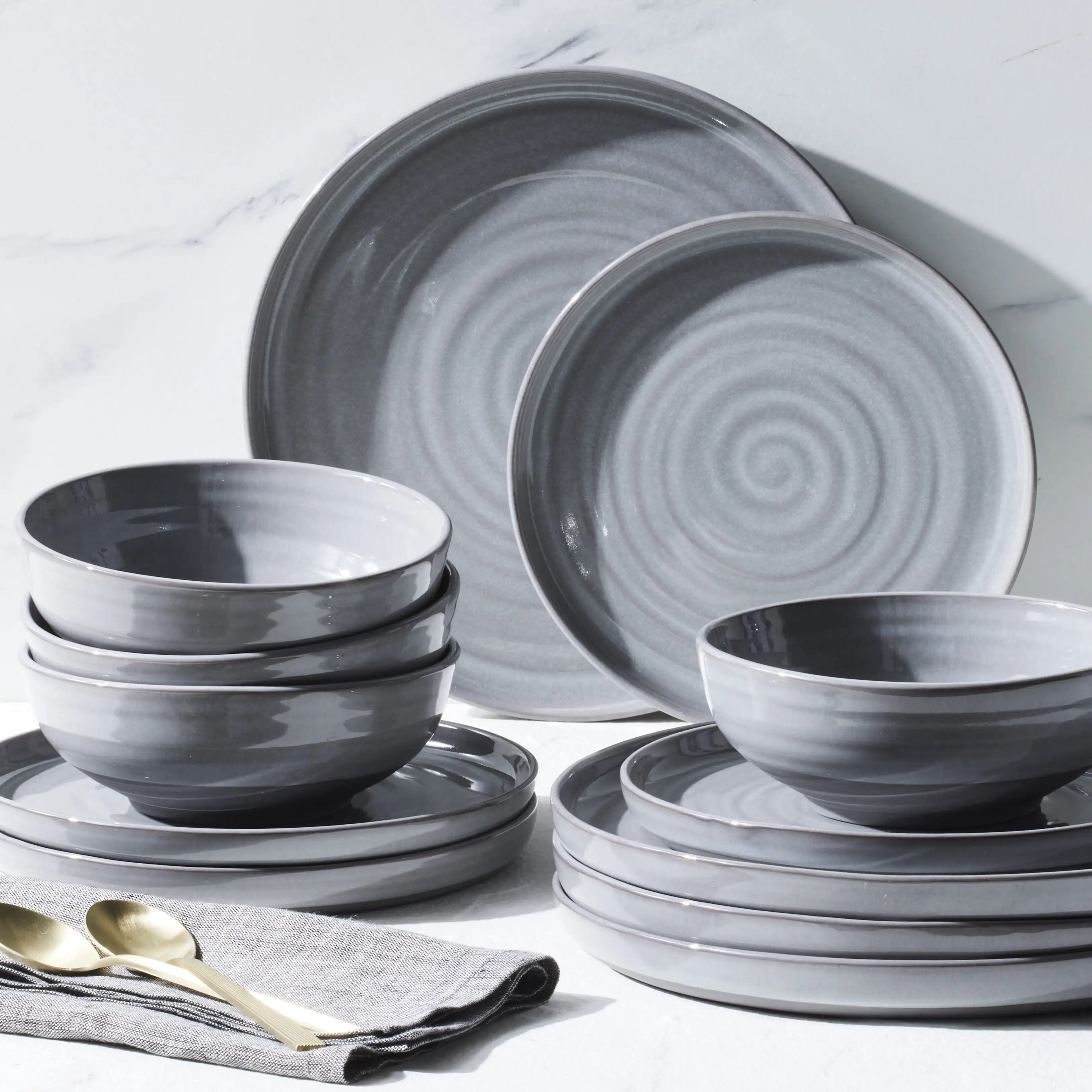 

-Collins Grey Stoneware 12-Piece Dinnerware Set