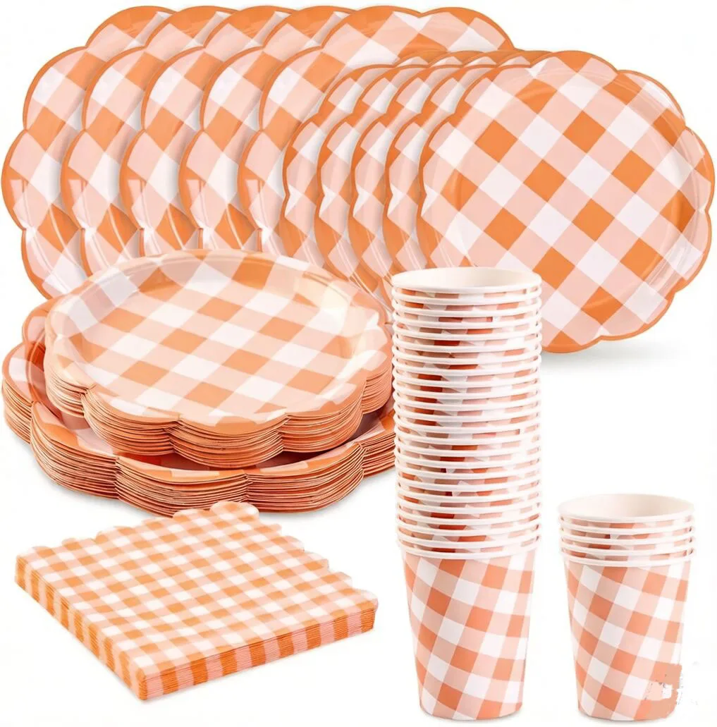 

New orange checkered disposable party supplies including paper plates, cups, napkins, straws, birthday celebration party supplie