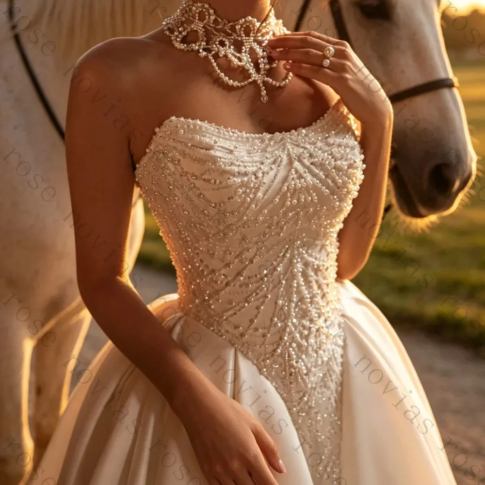 Customized Luxury Strapless Beaded Satin Wedding Dress Waist Cinched Fluffy Princess Bridal Gown Suitable for Formal Occasions