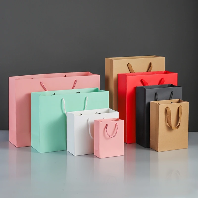 100pcs gift bags Shopping bags/Free logo printing/thickened paper bags/clothing packaging tote bag customization