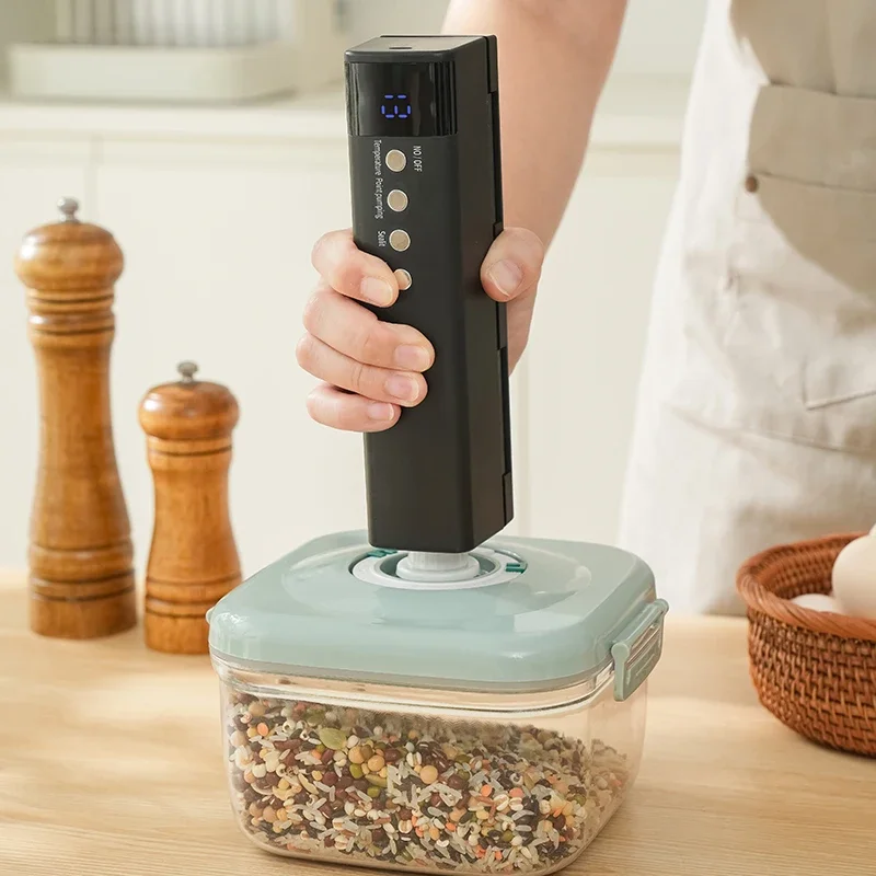 Mini draadloze volautomatische vacuümsluitmachine Huishoudelijke kleine draagbare voedselverpakking Plastic sluitmachine, keukengerei