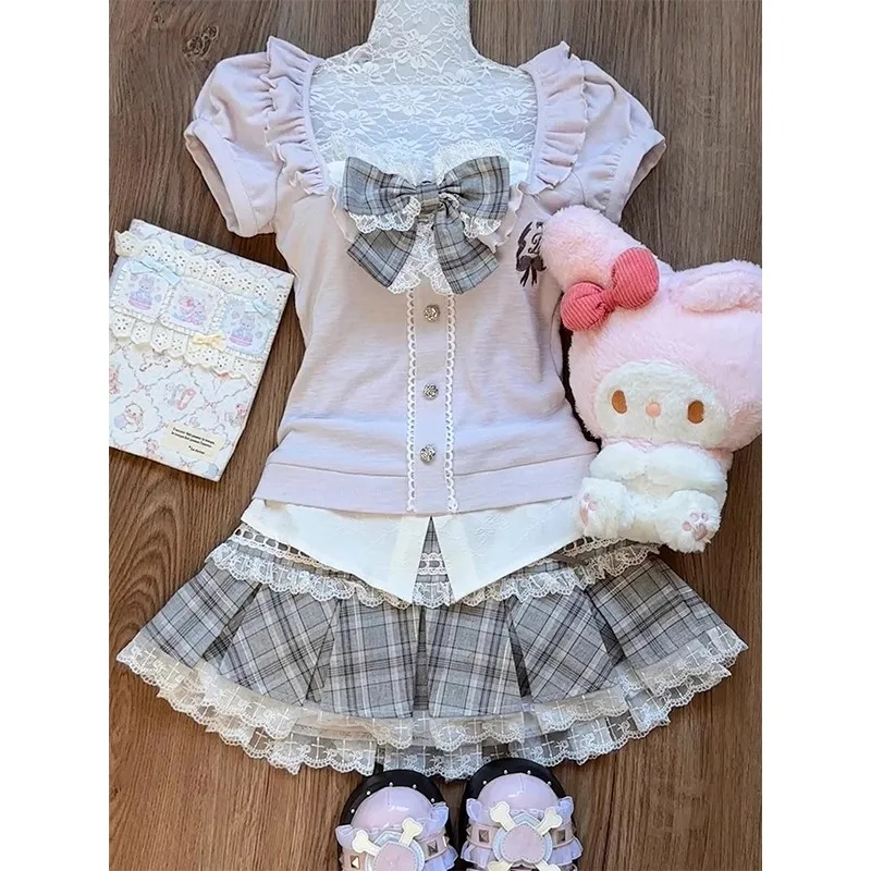 Women's pink lace patchwork top with large bow and puff sleeves, gray plaid high-waisted pleated skirt two-piece set, Lolita style, Japanese sweet girly style, soft girl style, JK style, Harajuku style, princess style, retro cute, age-reducing, slimming, fitted outfit for spring and summer, daily wear, dating, shopping, photo shoots, parties, anime conventions, campus style, two-dimensional girl, school uniform style, fashionable outfit with bow decoration, lace trim, plaid pleated skirt, sweet and cool girl view 3