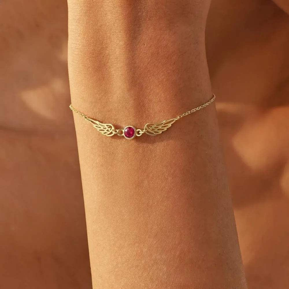 

Браслет с ангельскими крыльями и камнем рождения, из нержавеющей стали с золотым покрытием, с зеленым кристаллом, украшение для женщин, подарок на день рождения, оптом