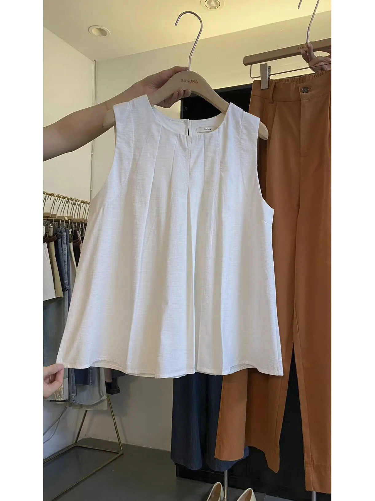 Letnia kolekcja 2025 Koreański Styl Prosty Luźny Damski Wyszczuplający Top z Efektem Wyszczuplania Jednolity Kolor Dojazdy Do Pracy Moda