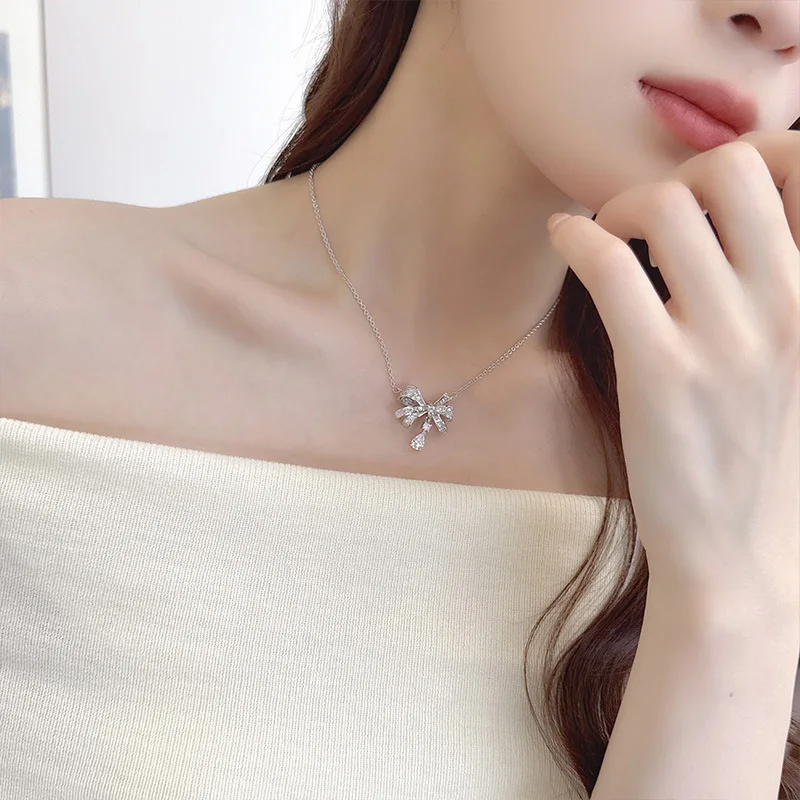 قلادة على شكل قطرة ماء على شكل فيونكة من الزركون مرصعة بالزركون، وسلسلة عنق نسائية راقية وسلسلة الترقوة