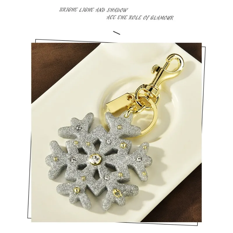 Breloczek do kluczy z marzycielskim płatkiem śniegu, modna zawieszka do torebki, akcesoria do torebek, zarówno trendy jak i klasyczny.