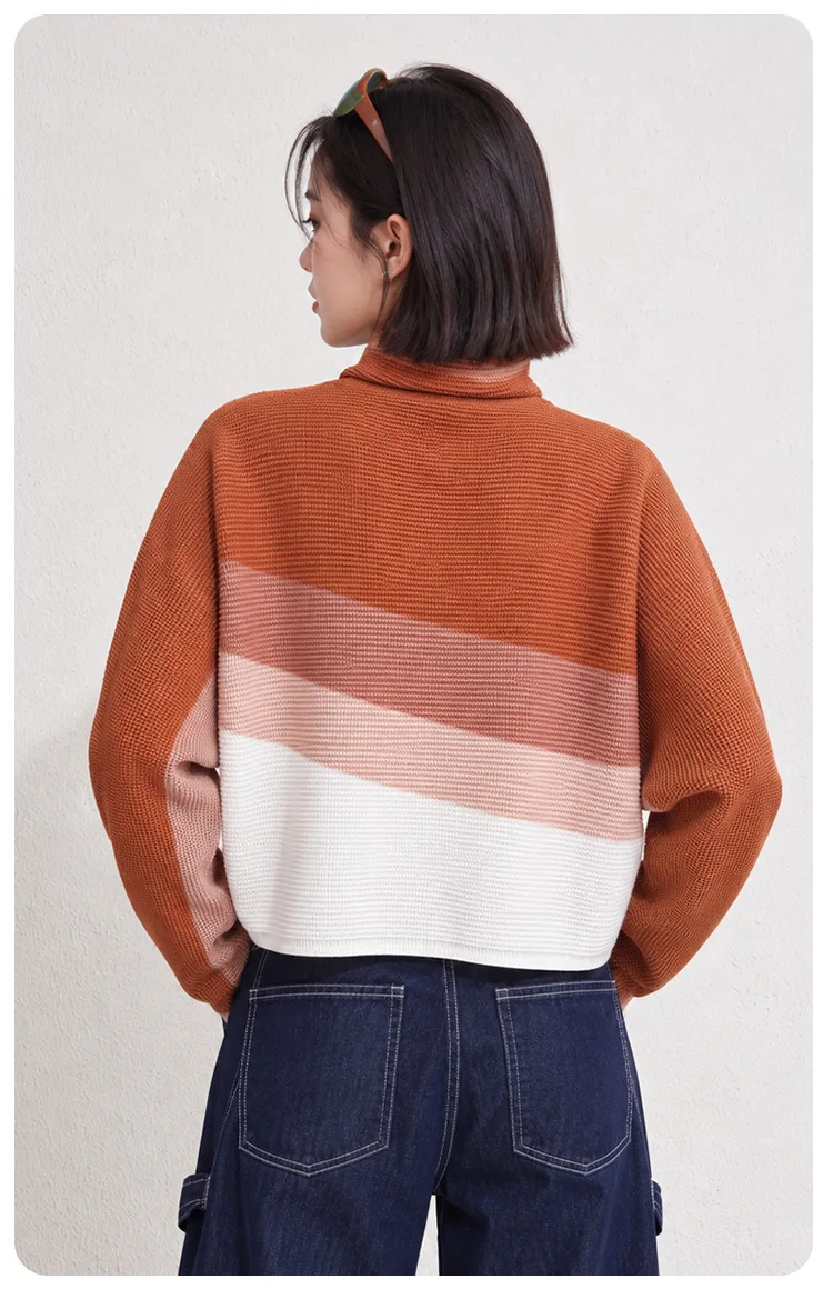 Issey Miyake-style pleated women's top: Autumn print, draped high neck, batwing sleeves, cropped length.