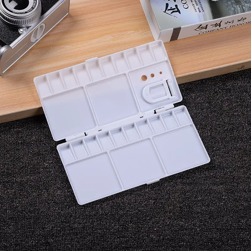 

Y1UB White Plastic Paint Palette Box Watercolor Paint Palette Box Watercolor Tray With 25 Grids Flip Cap Folding Art Supplies