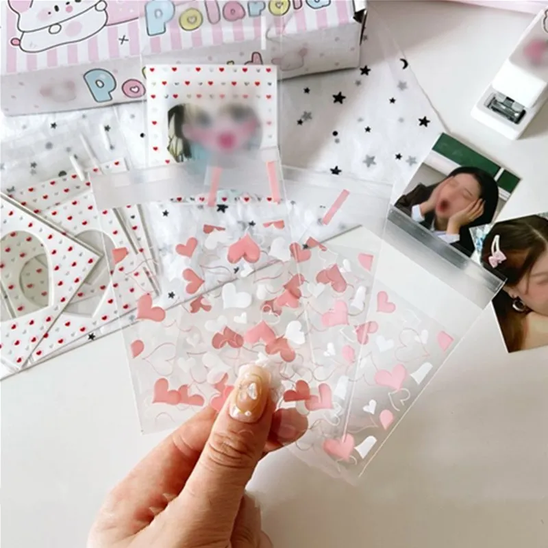 100pcs/lot Transparent Plastic Bag Candy Heart DIY OPP Bag Self Adhensive Bags Packaging Bags 7*7cm Cards Holder Storage Case