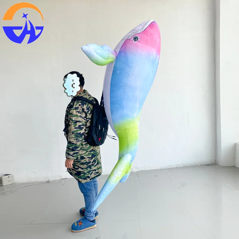 Inflatable cartoon figure carrying fish air model interactive props for marine animal performances in shopping malls and bars