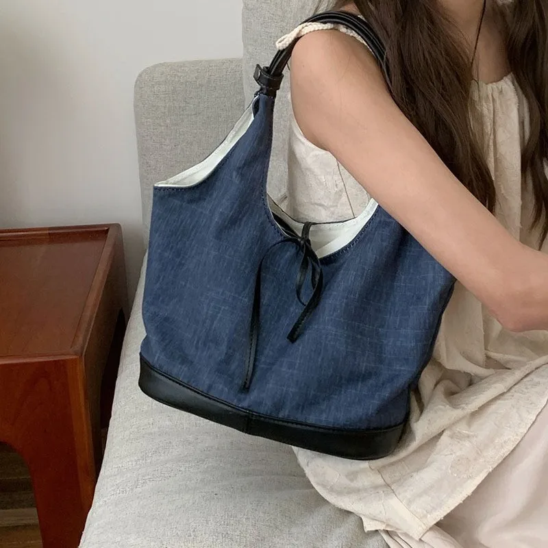 

Literary fashion canvas tote bag female 2025 new commuter handbag versatile single shoulder armpit bag crossbody bags
