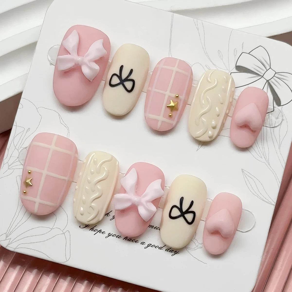10 pieces/set of handmade and pasted fake nails Short oval nails，Pink Sweater Pattern Striped Bow Heart-shaped Fake Nails