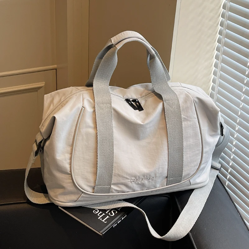 Expandable travel bag, large capacity, for travel luggage storage, handheld, lightweight crossbody