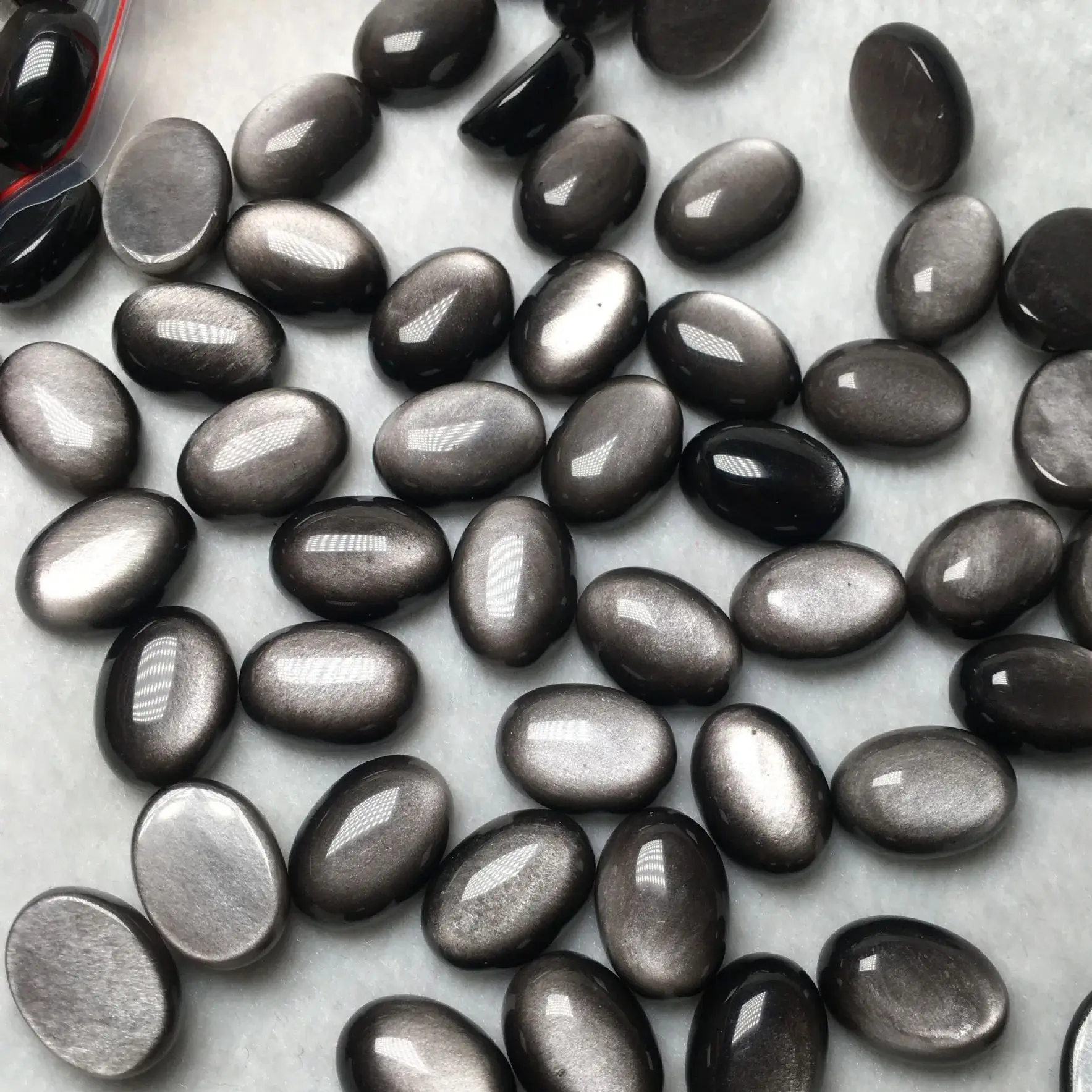 Venta al por mayor 10 unids/lote obsidiana de ojo gris genuino 8x10mm cabujón de piedras preciosas ovaladas, cara de anillo de gema para joyería