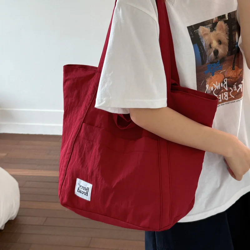 

Нейлоновая сумка, легкая и простая, подходит для поездок на работу, сумка через плечо с уникальным дизайном, холщовая сумка для женщин.