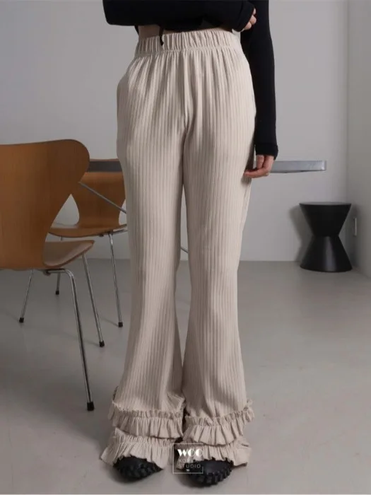 Primavera 2025 Dongda Gate Pantaloni a campana slim fit da donna Pantaloni lunghi in pizzo floreale micro svasato elastico in puro colore