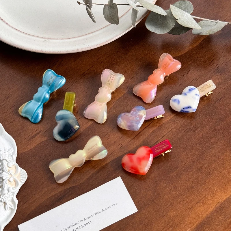 مشبك شعر مصنوع من لوح حمض الأسيتيك مشبك صغير بحافة صغيرة مع غرة على شكل فراشة مكسورة لطيفة ومتعددة الاستخدامات للعناية على شكل قلب أغطية رأس جديدة