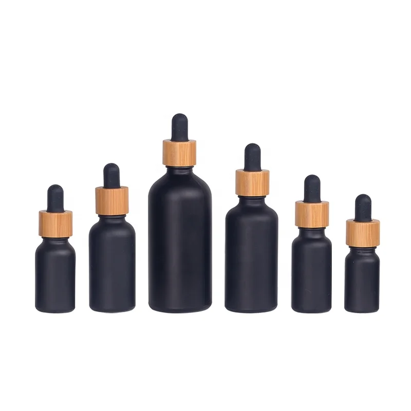 

50pcs 50ml matte black glass dropper bottles 15 ml 30 ml 100 ml empty essential oil bottles with bamboo wood dropper for serum