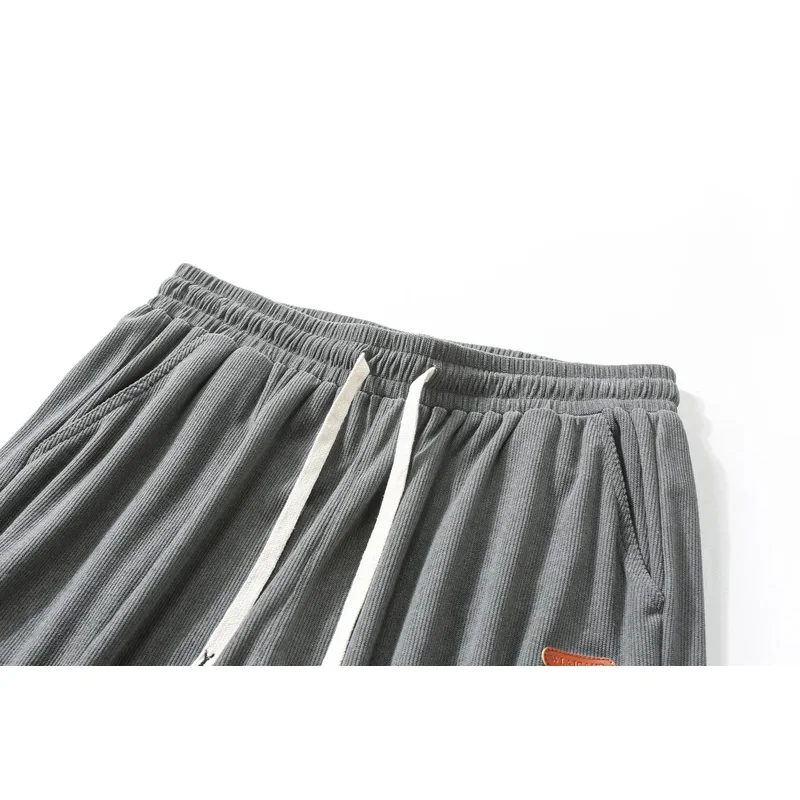 الرجال العلامة التجارية الجديدة الرجعية العصرية بلون السراويل الرياضية عارضة فضفاض مستقيم الساق العصرية قيعان متعددة الاستخدامات