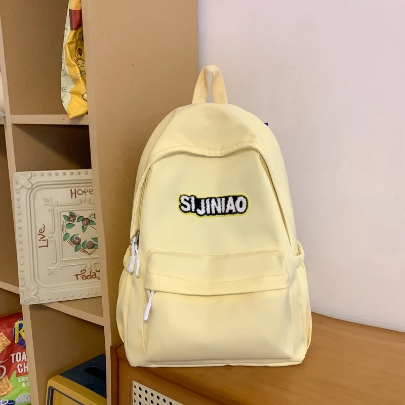 High Capacity Letter Print Solid High Quality Nylon School Bags 2024 Hot Sale Backpacks for Girls and Boys Bolsos Colegio