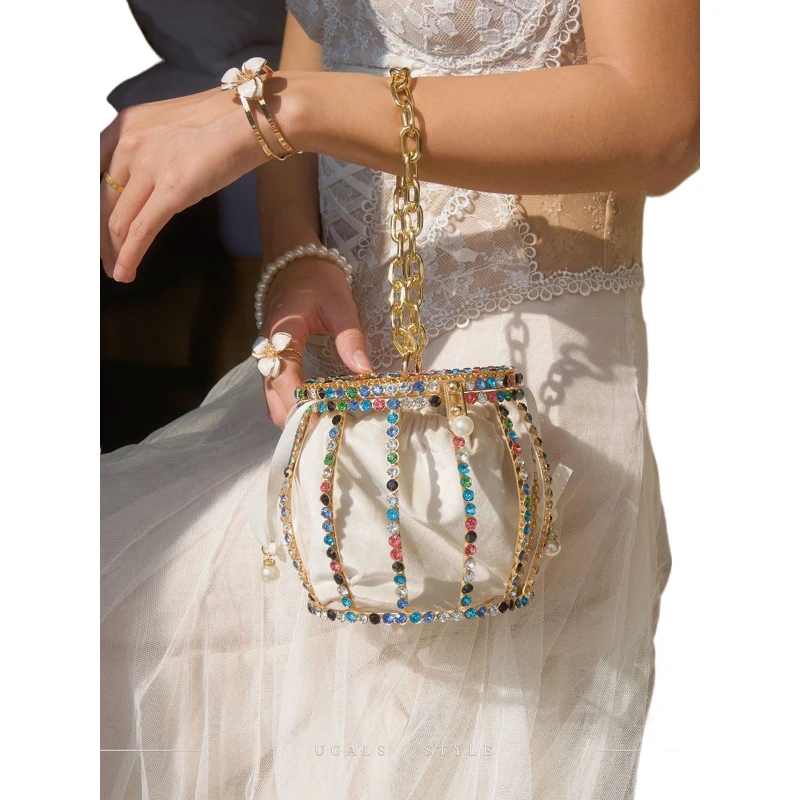 Retro metal spherical pearl lantern bird cage hollow banquet light luxury niche bucket hand messenger bag