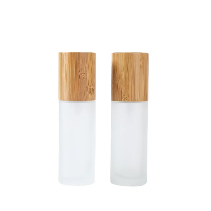 

50pcs 20ml 30ml 40ml 50ml 60ml 100ml 120ml 150ml bamboo lid glass bottle frosted glass lotion pump bottle with bamboo spray lid