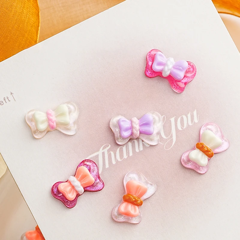 โบว์เรซิ่นผสม10ชิ้น/ถุงการตกแต่งศิลปะเล็บอะคริลิก3D เสน่ห์น่ารักชิ้นส่วนอุปกรณ์ทำเล็บพลอยเทียม DIY โบว์สีสันสดใส