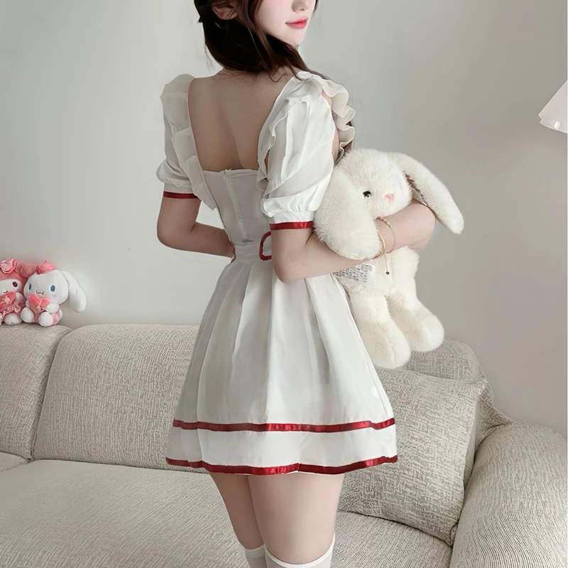 Uniforme de enfermera para mujer, Cosplay Sexy, dulce amor, corazón hueco, vestido de Lolita, conjunto de trajes, Carnaval de Halloween, encantadores disfraces de sirvienta