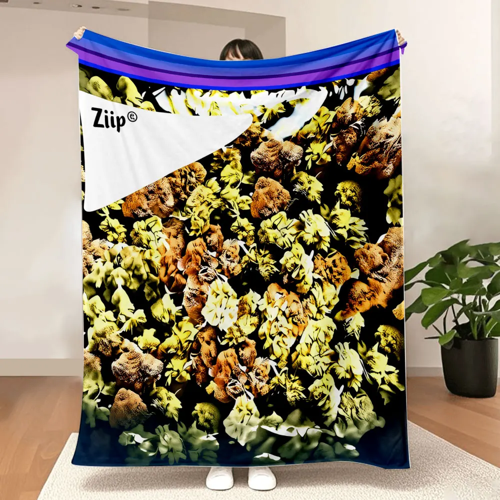 Plant Art Blanket – A soft and cosy throw featuring a rich, dark base adorned with a chaotic yet intricate pattern of yellow-gre