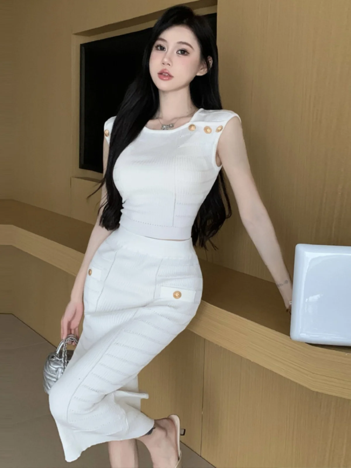 Conjunto de duas peças de colete curto de malha e e saia bodycon de meio crimento, conjunto moderno e ajustado para...