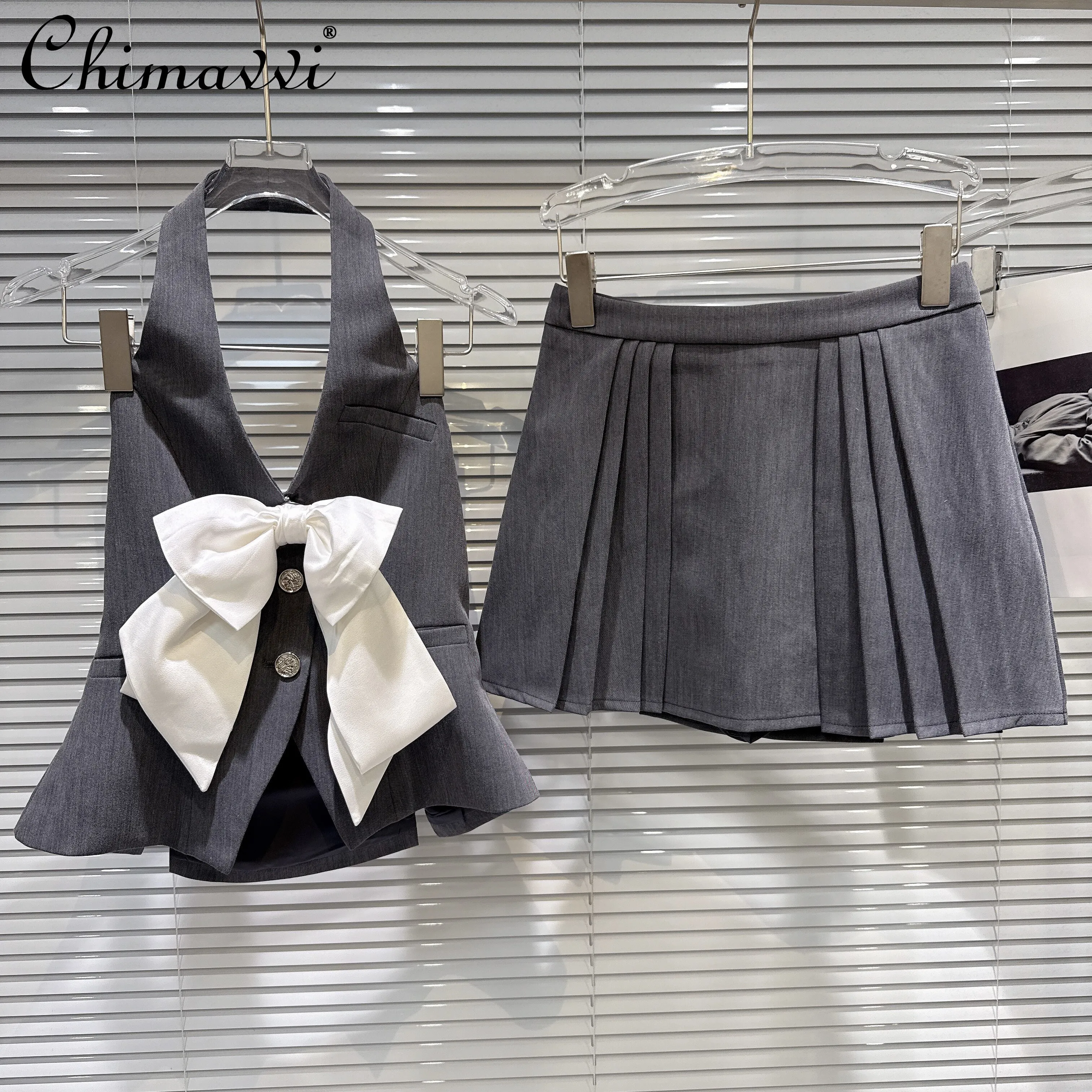 

2026 Summer Korean Elegant Sweet Celebrity 3D Bow Halter Neck Sleeveless Top High Waist Pleated Short Skirt Two-piece Set Women