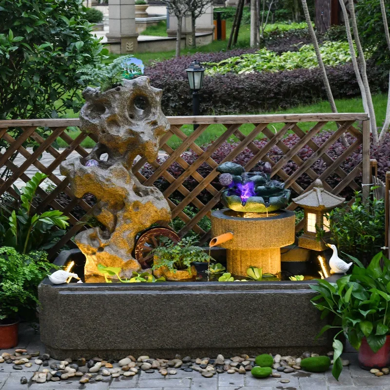Outdoor balcony circulating water system flowing water ornament stone grinding courtyard water feature fish tank imitation stone