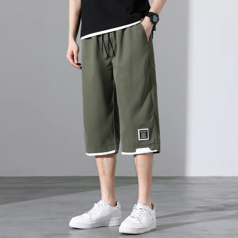 

Fashion Elastic Lace Up Spliced All-match Capri Pants Men's Clothing 2024 Summer New Loose Solid Color High Waist Casual Pants