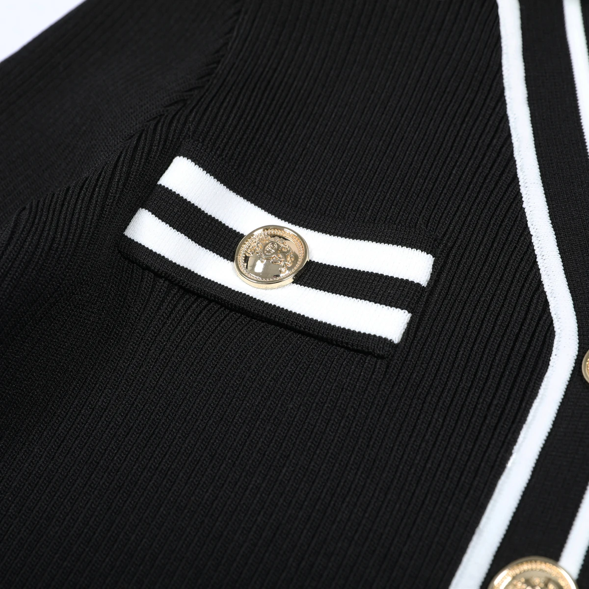 Primavera y otoño nueva moda viajero manga larga cuello empalme tira camisa de punto de las mujeres cárdigan versátil abrigo