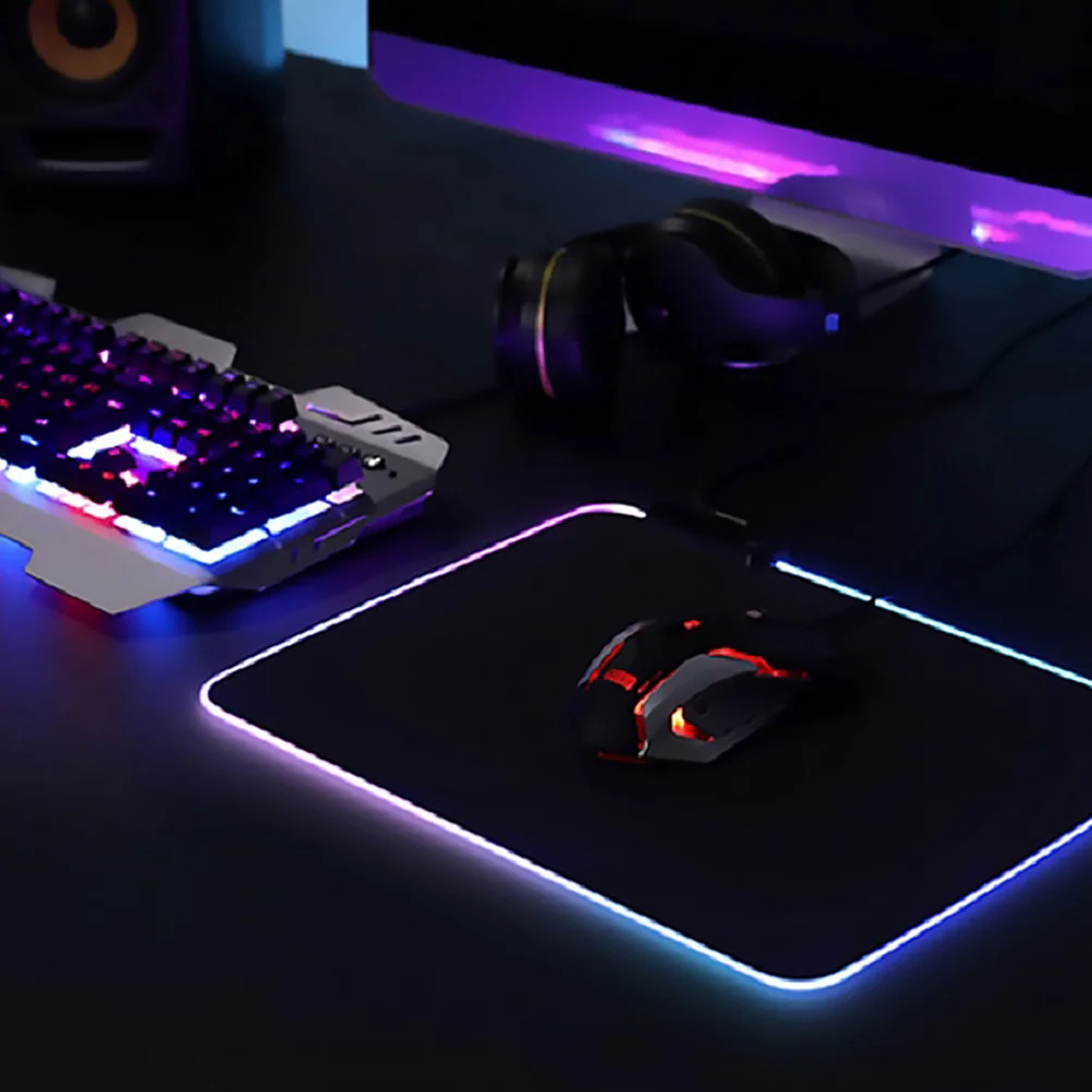 

Glowing Waterproof Mouse Pad Gaming Computer Keyboard Mat Non Slip Rubber Back 14 Light Modes Memory Save Function
