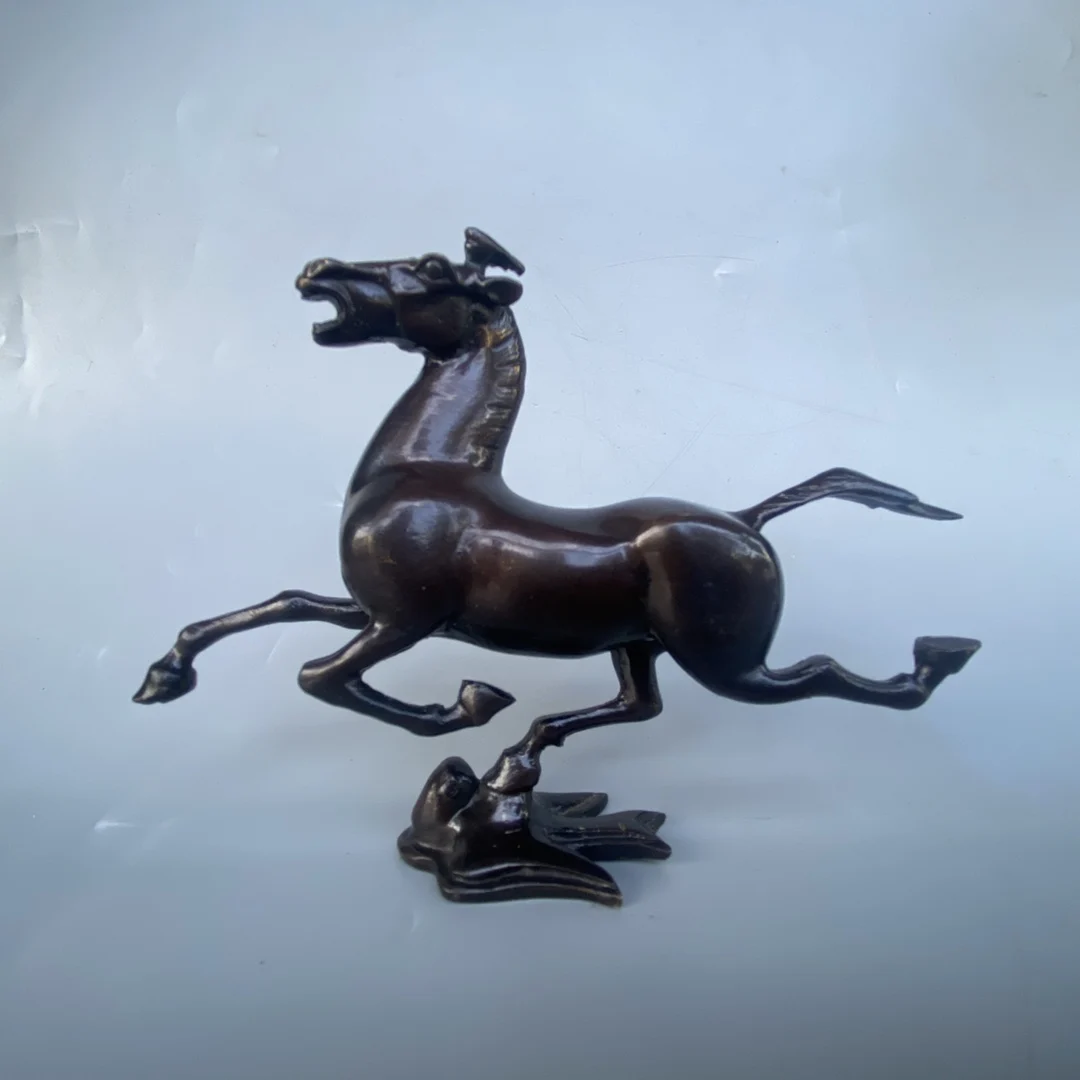 

Bronze statue A horse treads on a flying swallow 16X3X11 CM, 0.3 KG