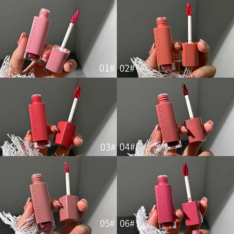 ลิปกลอส HERORANGE แบบกระจก ลิปกลอสเนื้อใส ติดทนนาน ลิปสติกเนื้อลิควิด สีแดงเซ็กซี่ เครื่องสำอางบำรุงริมฝีปาก ชุ่มชื้น กันน้ำ